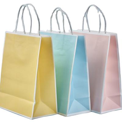 China Recyclable Color Kraft Paper Bag With Handles Festival Gift Bag High Quality Shopping Bags for sale