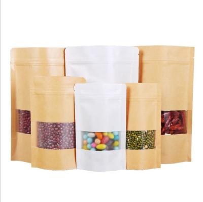 China Disposable Custom Biodegradable Reusable Food Pouch Bag Stand Up Zip Lock Kraft Paper Pouch With Window for sale