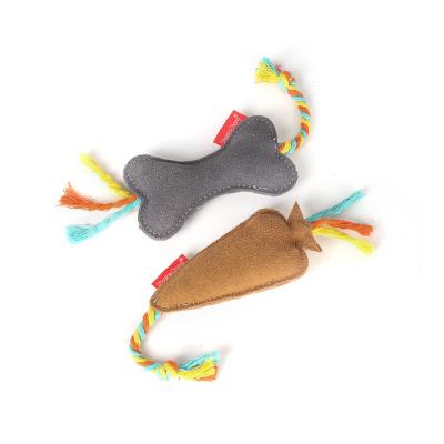 China Small Size Durable Natural Genuine Leather Stocked Sound Generator Dog Teething Squeaky Chew Bite Toy for sale