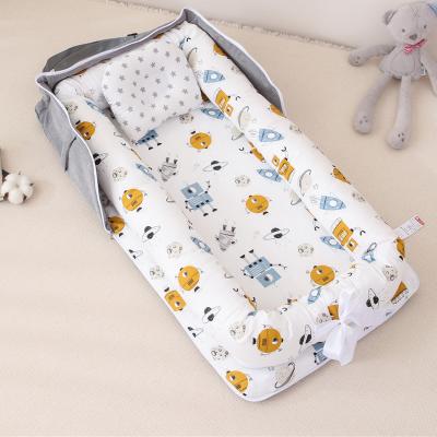 China Modern Organic Pophorn Bedding Cotton Pillow 3 In 1 Toys Around Safety Crib Bag Baby Wearable Travel Bed With Bag for sale