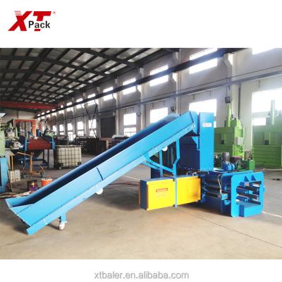 China XTPACK-Hydraulic Recycycling Escarpment Baler Hydraulic Carton Baling Press for sale