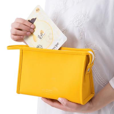 China Durable And Lightweight Candy Colored Cosmetic Storage Bag Leather Beauty Makeup Bag for sale