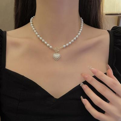 China TRENDY 20 Gold Plated Vintage Ins Cold Wind Crystal Stone Pearl Necklace Women's High Grade Steel Jumper Chain Collar Necklace for sale