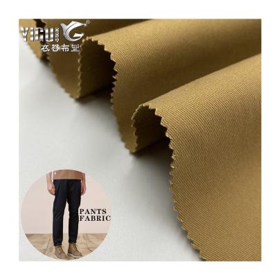 China 230GSM 70D High Density 97 Sustainable Cotton 3 Spandex Cargo Pants Fabric Khaki Peach Finished for sale