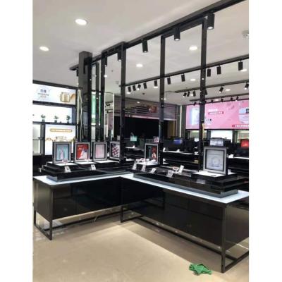 China MDF Cold Rolled Metal Steel Painted Interior Design Glass Cosmetic Ideas Store Luxury Makeup Display Cabinet With Waterproof Cosmetic Showcase for sale