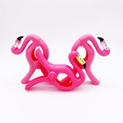 China Hot Selling Plastic Sand Flamingo Beach Towel Holder/Beach/ABS Amazon Swimming Pool Large Drying Clip for sale