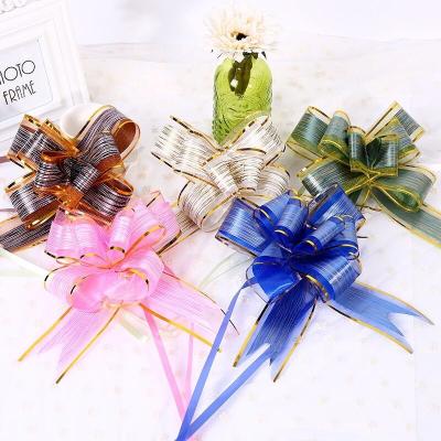 China Wholesale Plastic Valentine's Day Flower Bow , Snow Medium Wire Plastic Flower Pull Ribbon 30mm for sale