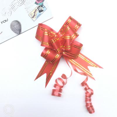 China Cheap Plastic Fashionable Flower Elastic Band Gift Wrapping Bow 30mm Butterfly Ribbon Gold Edge Gold Wrapping Ribbon for sale