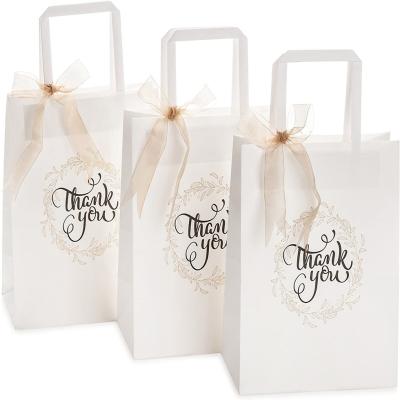 China Recycled Materials Best Selling High Quality White Geometric Design Kraft Paper Thank You Gift Bag With Ribbon Size 8 x 12.1 x 25.4 cm for sale