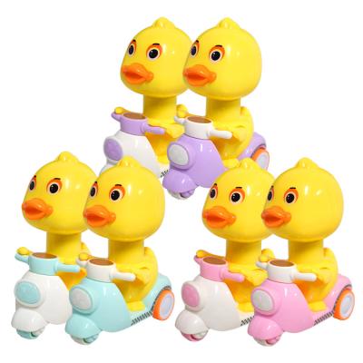 China Cute Duck Cake Topper Plastic Toys Duck Toy On A Bike Birthday Party Home Decoration for sale