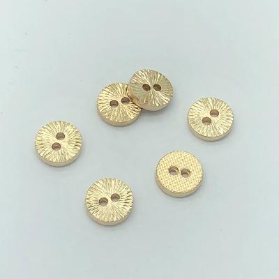 China Wholesale high quality nickel free two-hole gold name logo round pattern clothing metal die cut custom sewing buttons for sale