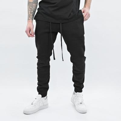 China Anti-wrinkle autumn and winter men's sports and leisure pants light panel working solid color plus velvet warm men's sweatpants for sale