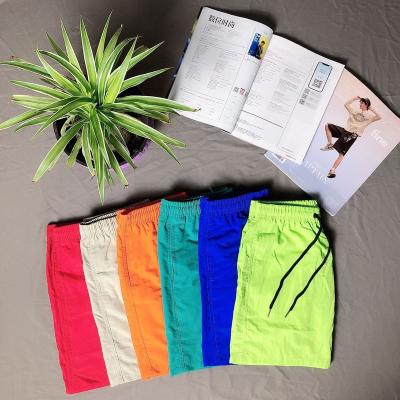 China 2022 Summer New Mens QUICK DRY Shorts Capris Beach Pants Candy Color Big Loose Fashion Can Be Customized for sale