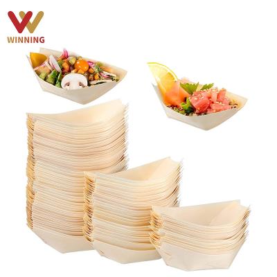 China 100% Biodegradable Compostable Eco Friendly Disposable Wooden Picnic Party Sustainable Gain Palm Leaf Camping Event Plates Boat Shape for sale