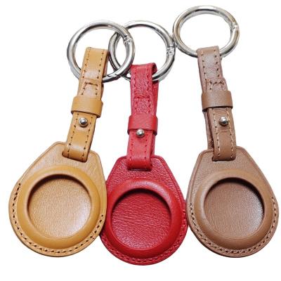 China Shockproof Official Design Airtag Tracker Protective Leather Airtag Genuine Leather Key Chain For Apple Airtag Case Leather Holder for sale