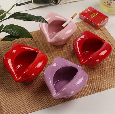 China Hot Selling Fashion Home KTV Smoking Lip Holder Shape Ceramic Ashtray Smoking Holder for sale