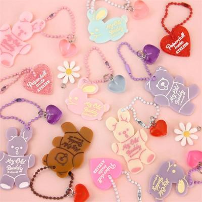 China Plastic Custom Bridesmaid Letter Acrylic Clear Resin Keychain Shaped Cartoon Anime Key Chain Gift With Glitter Glitter for sale