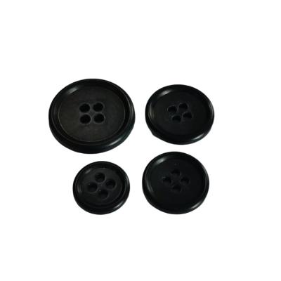 China 2022 Viable Hot Wholesale Black Urea Four Holes Custom Button Resin for sale