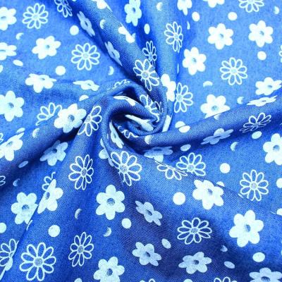 China 2023 Hot Selling Breathable Blue Woven Denim 65T/35R Floral Printed Breathable Fabrics For Women Clothing for sale