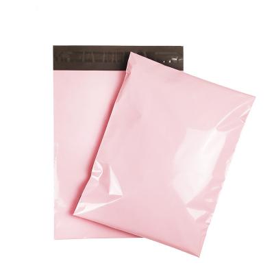 China Custom Eco-friendly Recyclable Logo Pink Color Cosmetic Folding Corrugated Mailing Mailing Bag Cardboard Mailing Gift Bags for sale