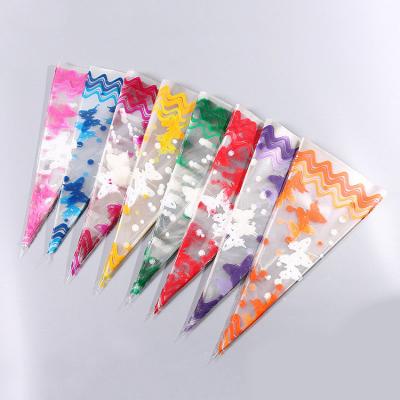 China 2021 disposable new wholesale cheap plastic candy sachets soft cellophane cone bag for candy for sale