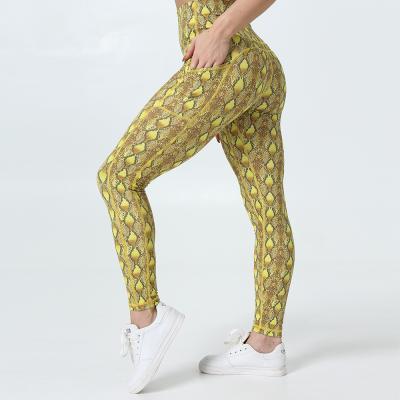 China Yellow Snake Print Anti-UV Yoga Pants Sports High Waisted Custom Pockets Yoga Fitness Legging For Women for sale