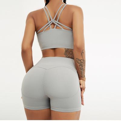 China Custom Gray Logo Anti-UV 2 Piece Yoga Set Sportswear Suit Gymwear Workout Clothes Butt Lift Yoga Shorts Set For Women for sale