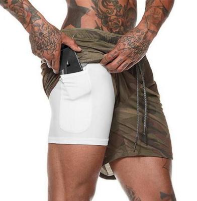 China QUICK DRY Custom Fitness Male Sports Shorts Solid Color Athletic Shorts Camouflage Workout Gym Shorts Men With Pockets for sale