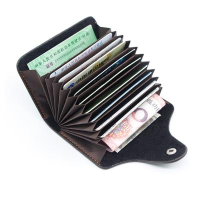 China Normcore/minimalist PU leather credit card holder, credit card wallet with button closure with 11 slots for sale