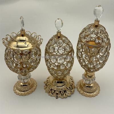 China Wholesale Unique Luxury Gold Metal Crystal Candle Holders Simple For Party Centerpiece Home Decoration Gift for sale