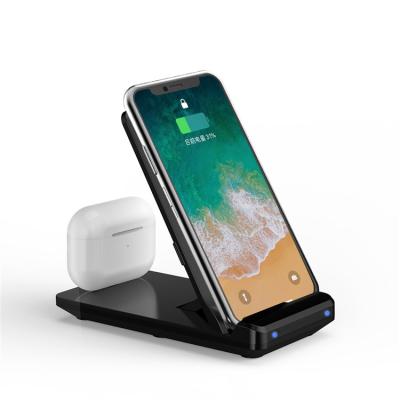 China 15W Mobile Phone Folding Vertical Radio Charging Two-in-one Mobile Phone Stand Fast Charging Station Wireless Earphone for sale