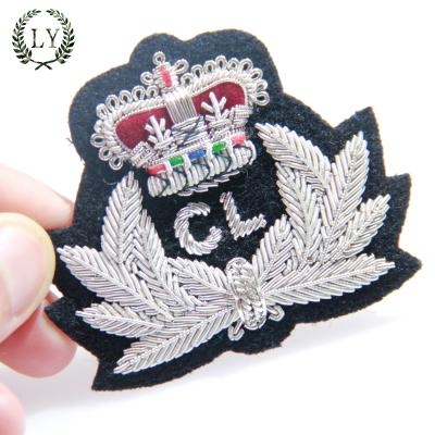 China Light Factory Custom Hand Embroidered Bullion Wire Army Safety Hat Badges and Military Badges on Hat for sale