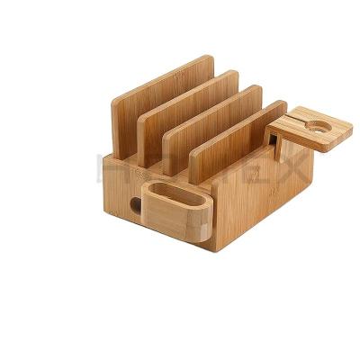 China Home Kitchen Bamboo Charging Station Rack Holder Organizer with 4 Slots Drawer for Multiple Devices for sale