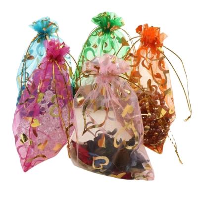 China Recyclable Custom Colorful Cosmetic Pouch Organza Bag In Stock , Candy Packaging Bags With Ribbon for sale