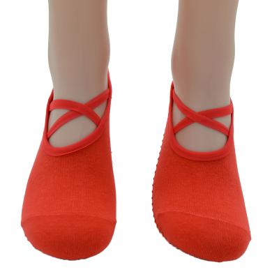 China Non-slip five-toed cross-strap silicone yoga socks with durable non-slip ladies cotton toe for sale