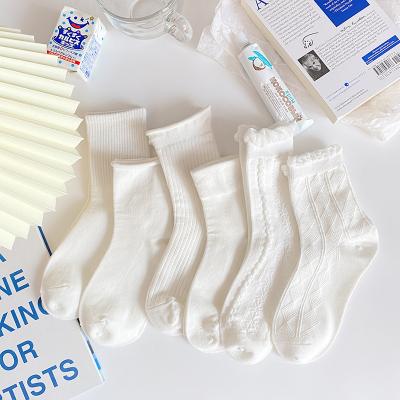 China Sporty Pure White Women's Lolita Solid Color All-match Mid-Calf Cotton Socks Cute Socks for sale