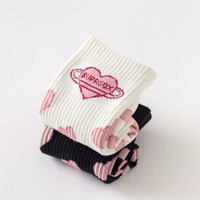 China Japanese style sporty women's love socks student trend black white cartoon mid-calf Korean stockings for sale