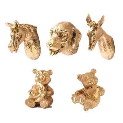 China Modern Luxury Brass Animal Key Furniture Handle Door Handles for sale