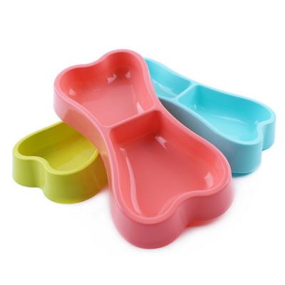 China Automatic Dog Feeder Plastic Candy Color Bone Shaped Double Head Bowl Pet Travel Feeder Cat Cutlery Dog Bowl Pet Bowl for sale