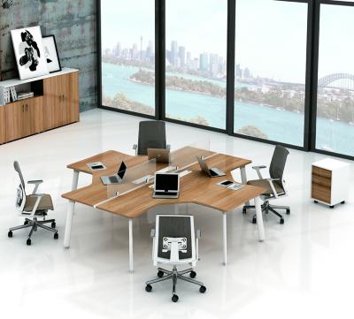 China Modular Expandable Staff Workstation Panel Office Workstation 4 Compartment People Workstation Table for sale