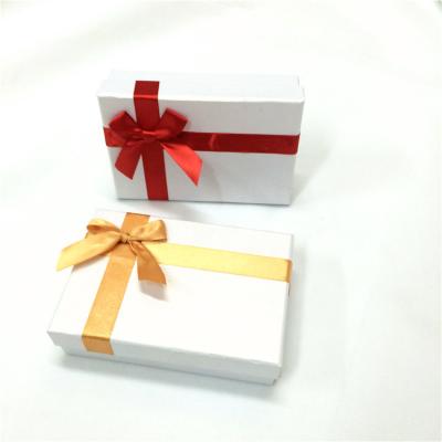 China Flip Paper Packaging Boxes Recyclable Top Separated Cardboard Gift Box For Party Favors With Ribbon And Flocking Insert Essential Oil Cosmetics for sale