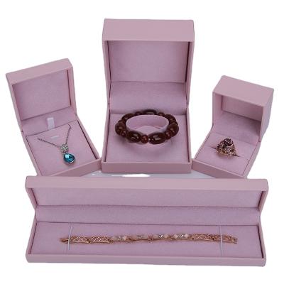 China Best Design Eco-friendly Ring Necklace Packaging Luxury Pink Cardboard Flocking Soft Jewelry Box With Logo Customized Box And Insert for sale