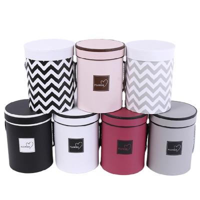 China Handmade Luxury Cylindrical Flower Packaging Paper Box With Lid Set 3 S M L Full Color Pantone Color Available for sale