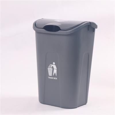 China Sustainable New Style Plastic Trash Can Laundry Basket Swing Top Wastebasket for sale