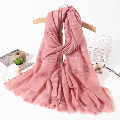 China Feeling fashion fashion solid color soft soft muslim hijab sweep fringe shawl cotton and women scarf canvas hijab for elegant women for sale