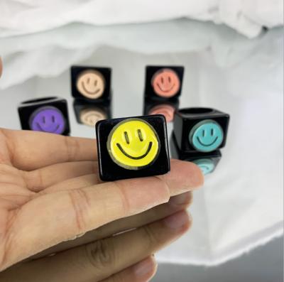 China 2021 Hot Selling Newest Fashionable Wholesale Colorful Happy Face Korean Women's Smiley Resin Rings Women's Resin Rings Jewelry For Girls for sale