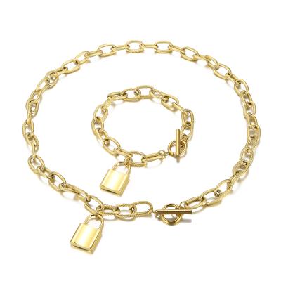 China FASHIONABLE Hot Sale 18k Gold Plated Customized Stainless Steel Lock Necklace Pendant Bracelet Set For Gifts for sale