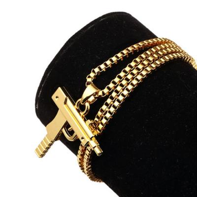 China Hiphop European Gold Gun Hip-hop Fashion Boys Style New Steel And American Gun Long Necklace for sale