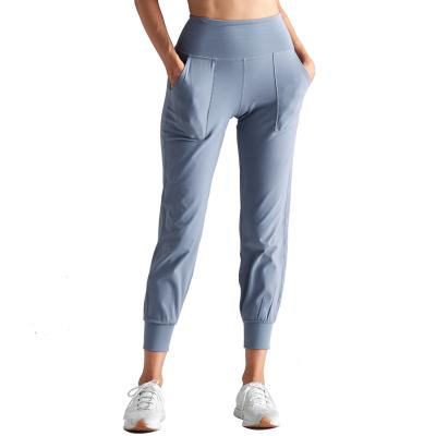 China 2021 New Pocket Breathable Loose Sports Running Pants Stretch Double Sided Bare Fitness Pants Yoga Pants for sale