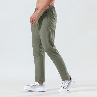 China                  Sports Quick Dry Pants Men Summer Loose Thin Ice Silk Outdoor Running Fitness Yoga Casual Training Pants              for sale